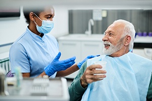 dentist explaining root canal to patient